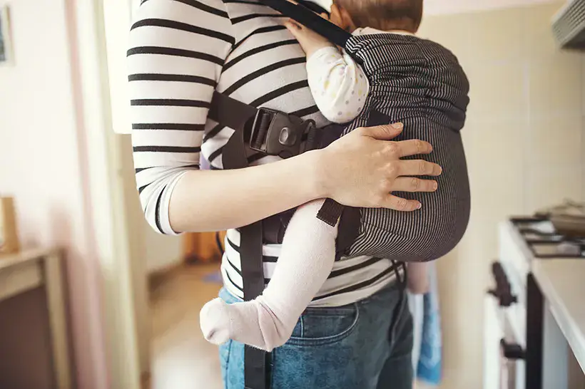 Baby sleeping in baby carrier
